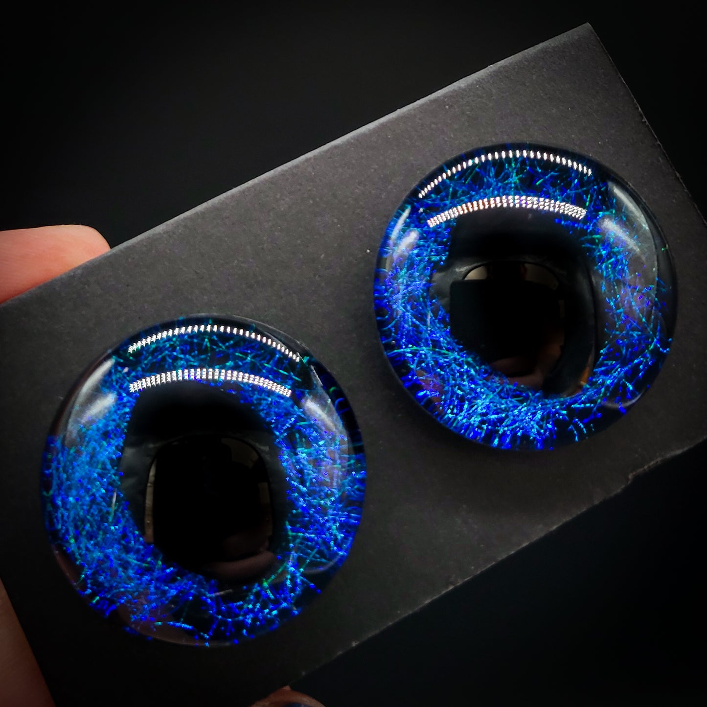 Interplanar Love Song - tangled blue-green strands over black