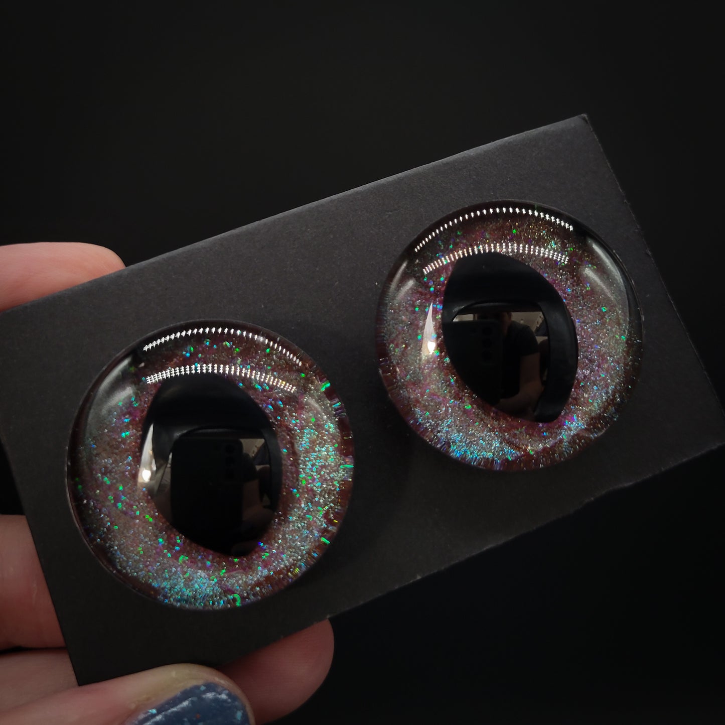 Calyx - cedar red-brown with a strong teal shift and green sparks